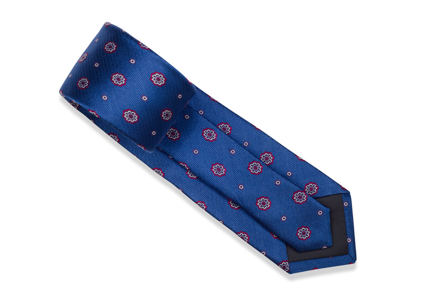 Blue Medallion Tie Set with Pocket Square and flower lapel pin from Ocean Boulevard