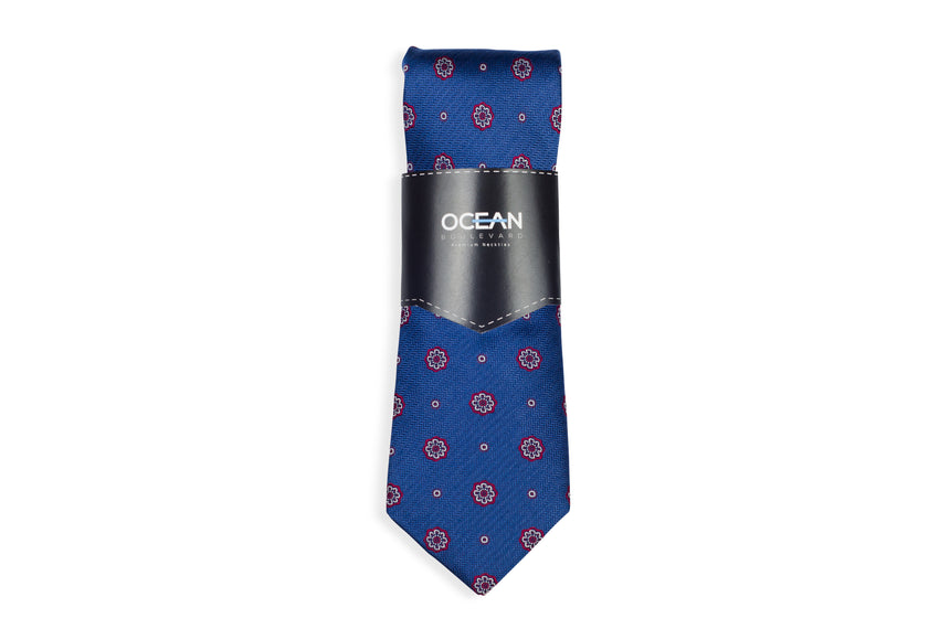 Blue Medallion Tie Set with Pocket Square and flower lapel pin from Ocean Boulevard